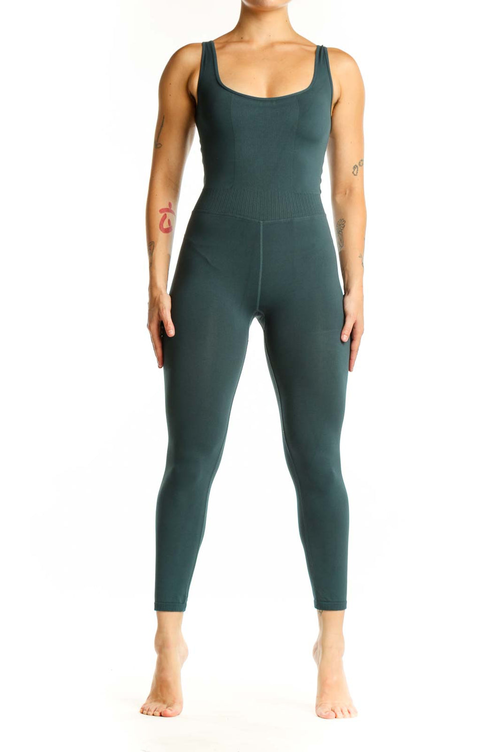 Front view of teal ribbed tank all-in-one jumpsuit with scoop neckline and fitted high-waisted leggings
