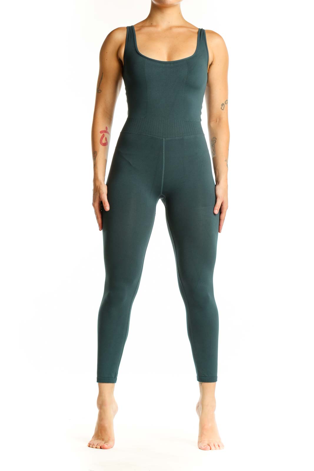 Front view of teal ribbed tank all-in-one jumpsuit with scoop neckline and fitted high-waisted leggings