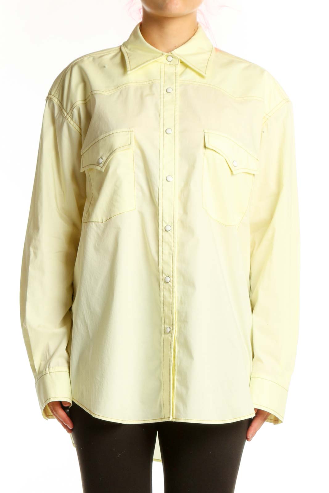 Cream cotton button-up shirt with collared neckline and chest pockets, front view