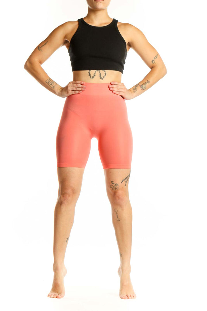 Coral high-waist biker shorts front view, Intimately Free People activewear