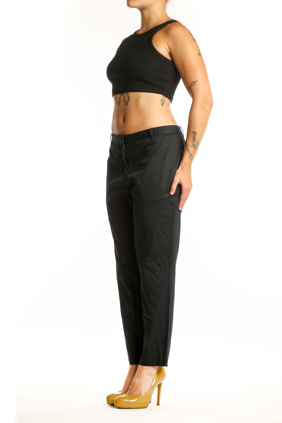 Black cropped dress pants from Allsaints, front view showing straight leg silhouette and cropped ankle length on size L