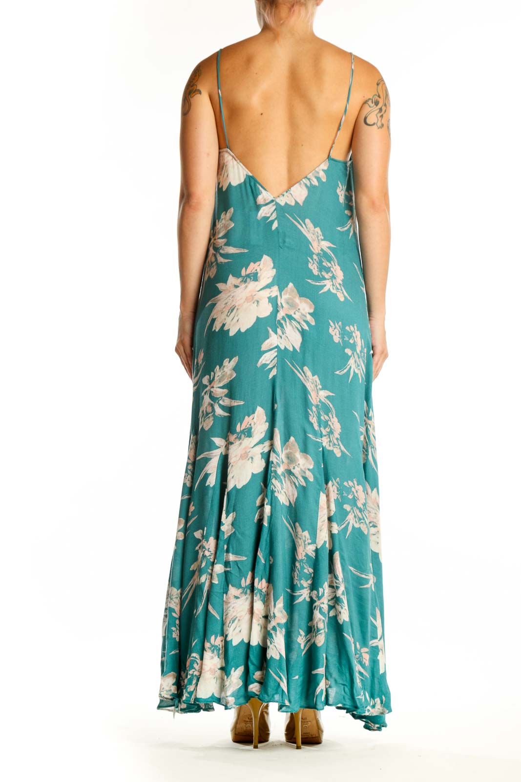 Teal rayon maxi dress with cream floral botanical prints, flowing silhouette, back view