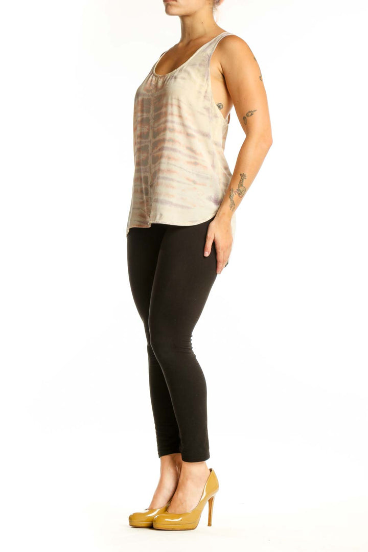 Cream tie-dye silk tank top with scoop neckline, front view on model