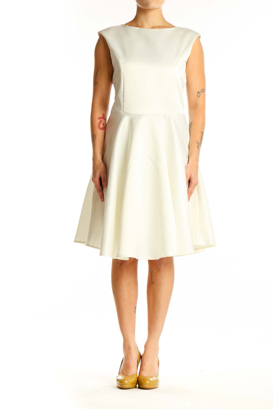 Front view of cream sleeveless A-line midi dress with crew neckline and flowing skirt