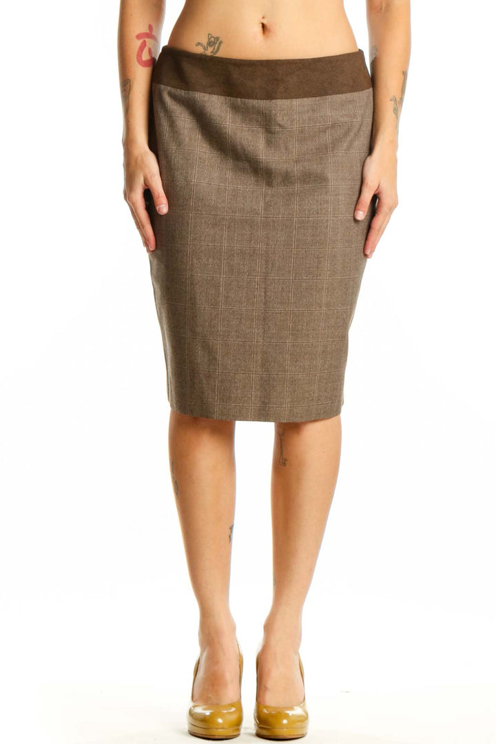 Brown pencil skirt with contrasting dark brown waistband, front view on model