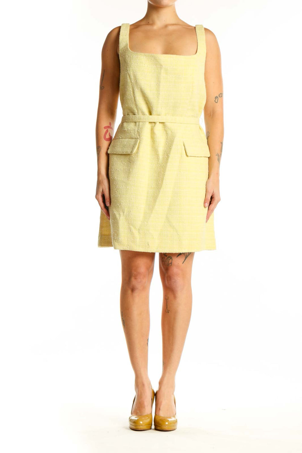 Yellow square neck sleeveless dress with patch pockets and cinched waist, front view