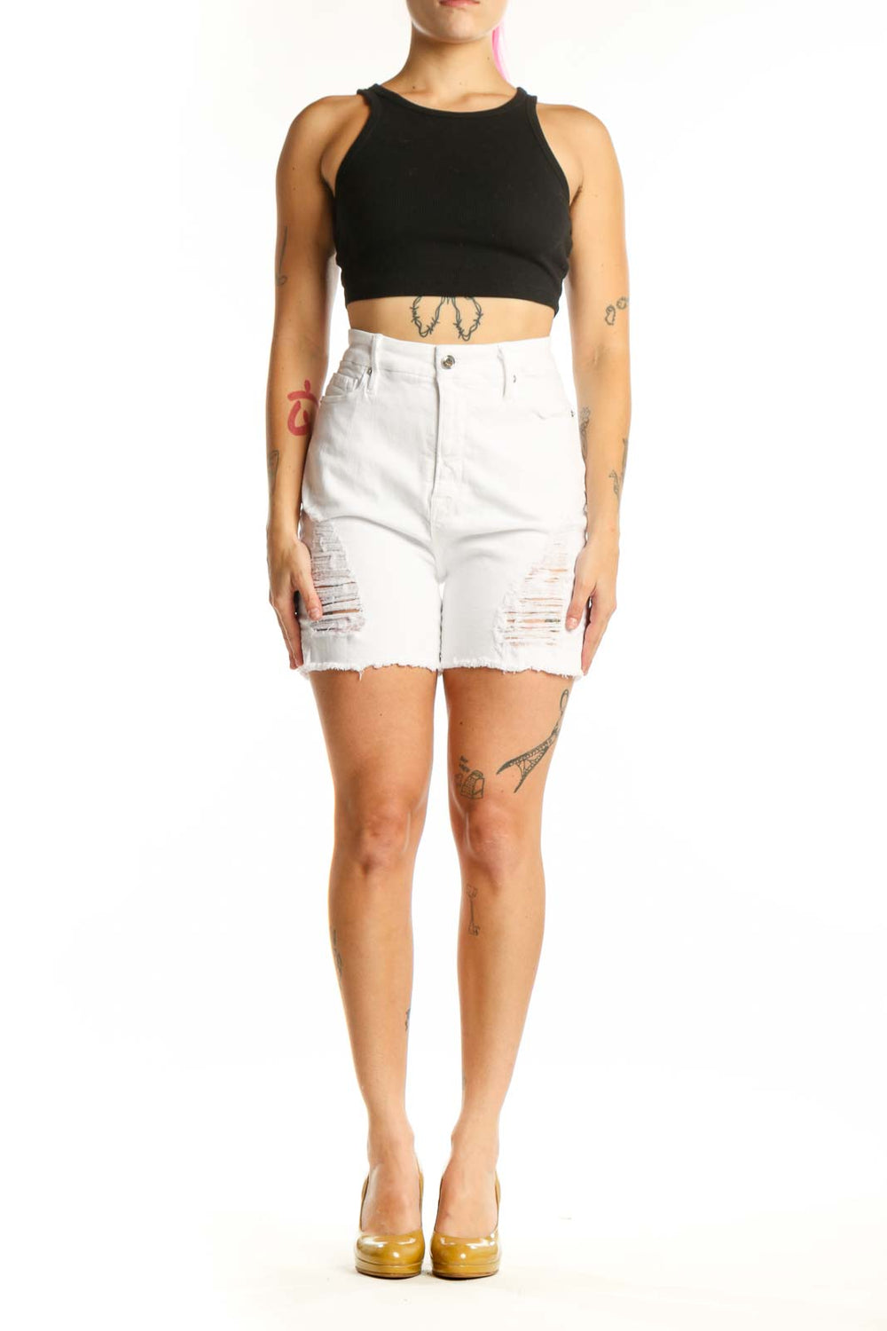 White distressed denim shorts with ripped thigh details and raw cut-off hem, front view