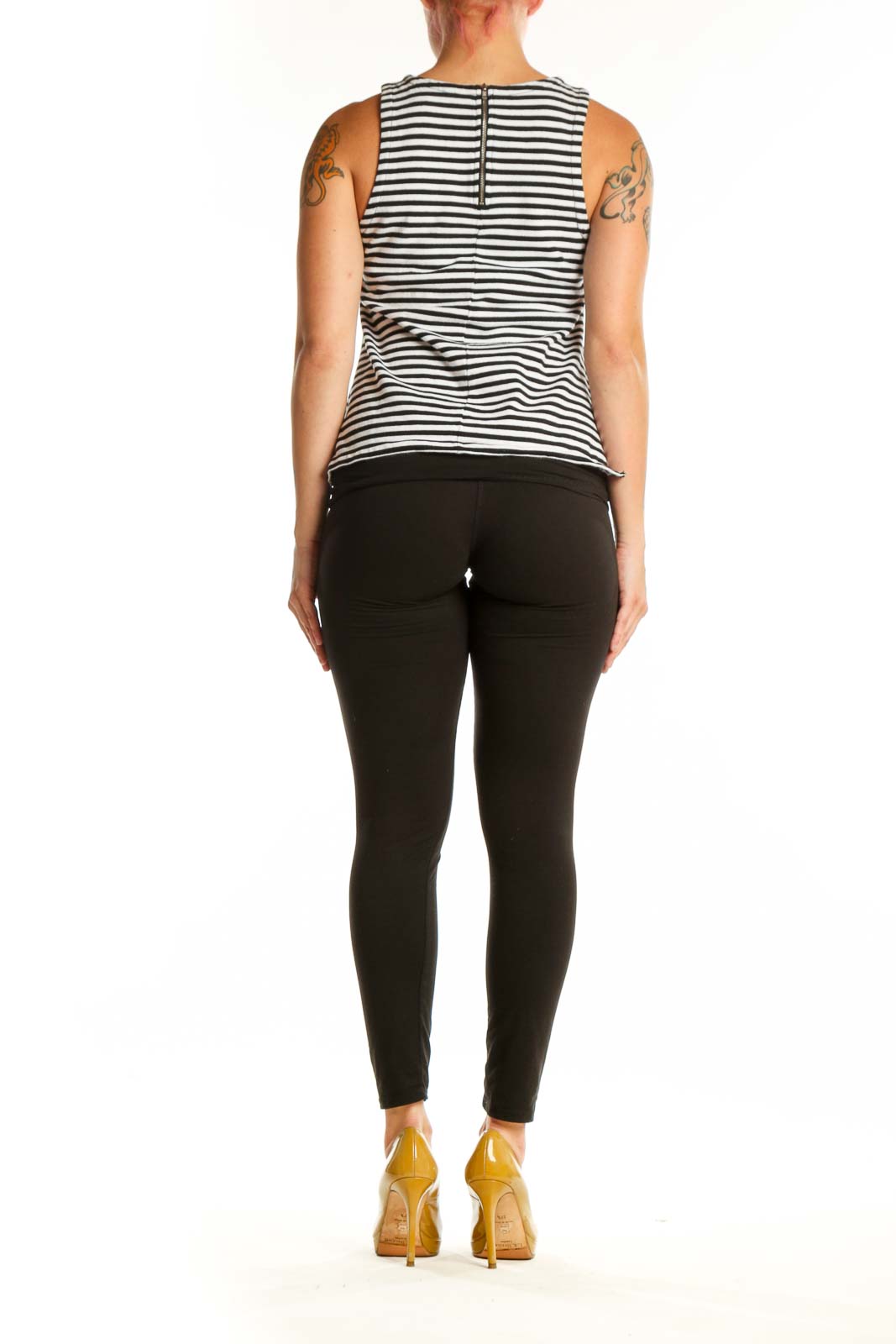 Navy and white striped sleeveless tank top, back view showing relaxed fit