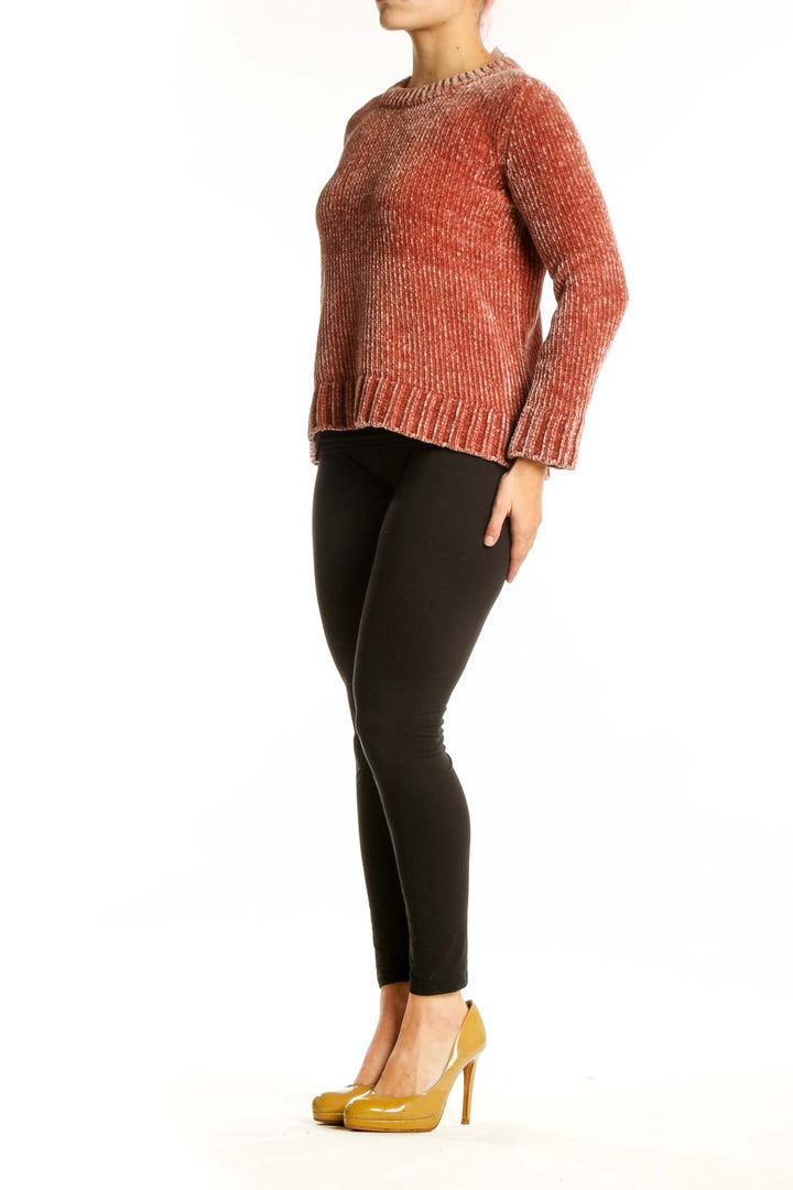 Rust ribbed knit pullover sweater with crew neckline and cropped silhouette, front view