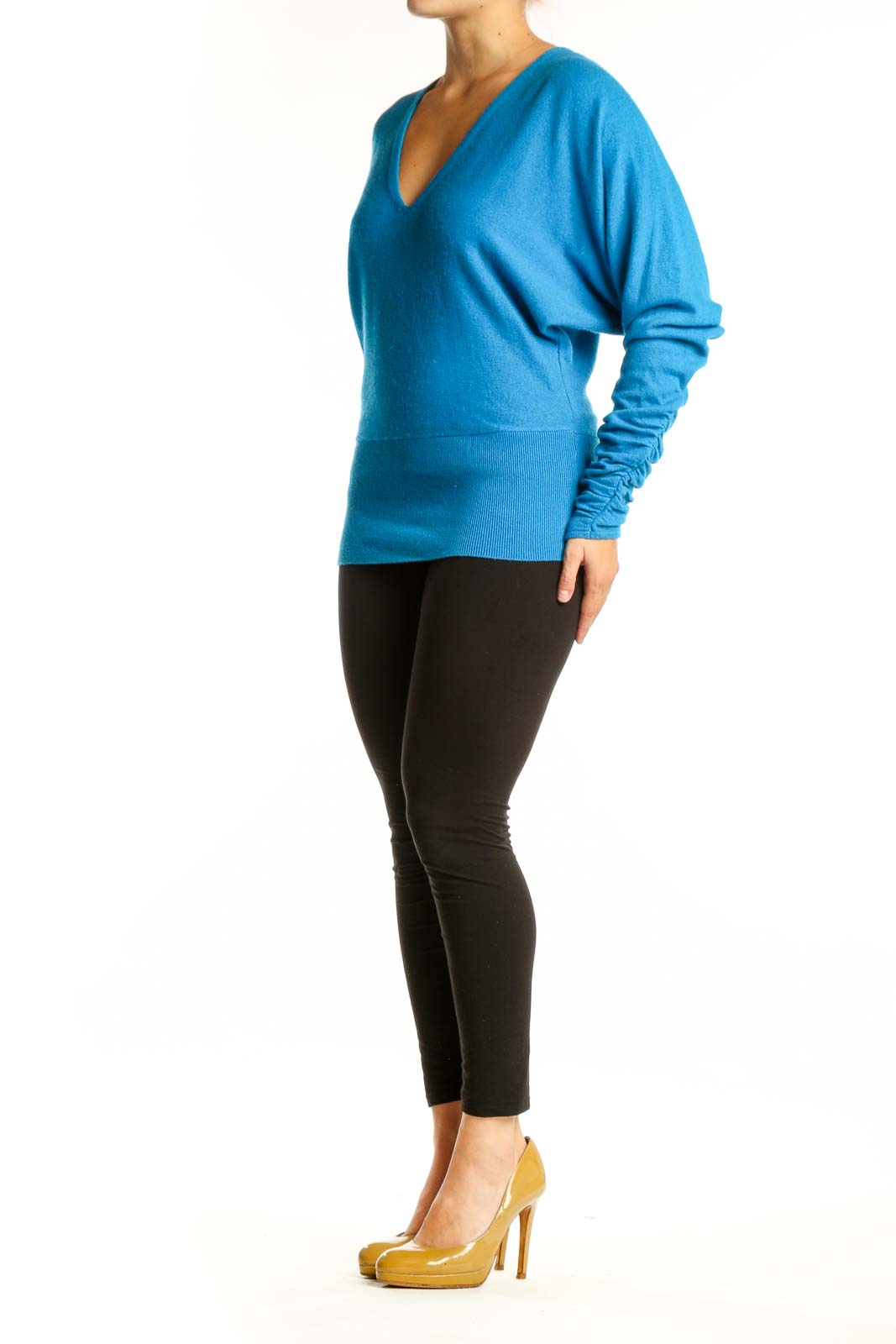 Blue V-neck cashmere blend knit sweater with ruched sleeves, front view on model