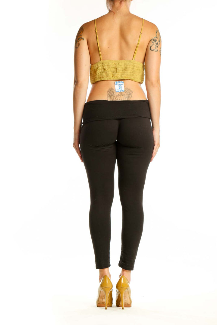 Yellow lace wrap crop top back view showing wrap design and adjustable straps