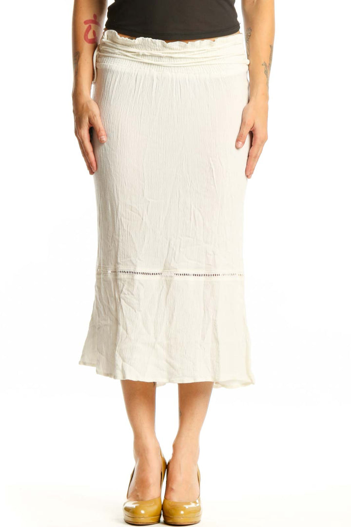 Cream pleated rayon midi skirt front view with decorative waistband and flowing silhouette