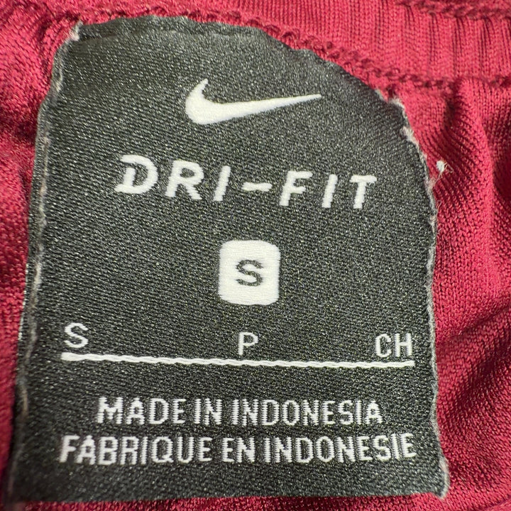 Burgundy Nike athletic shorts back view showing relaxed fit and athletic design