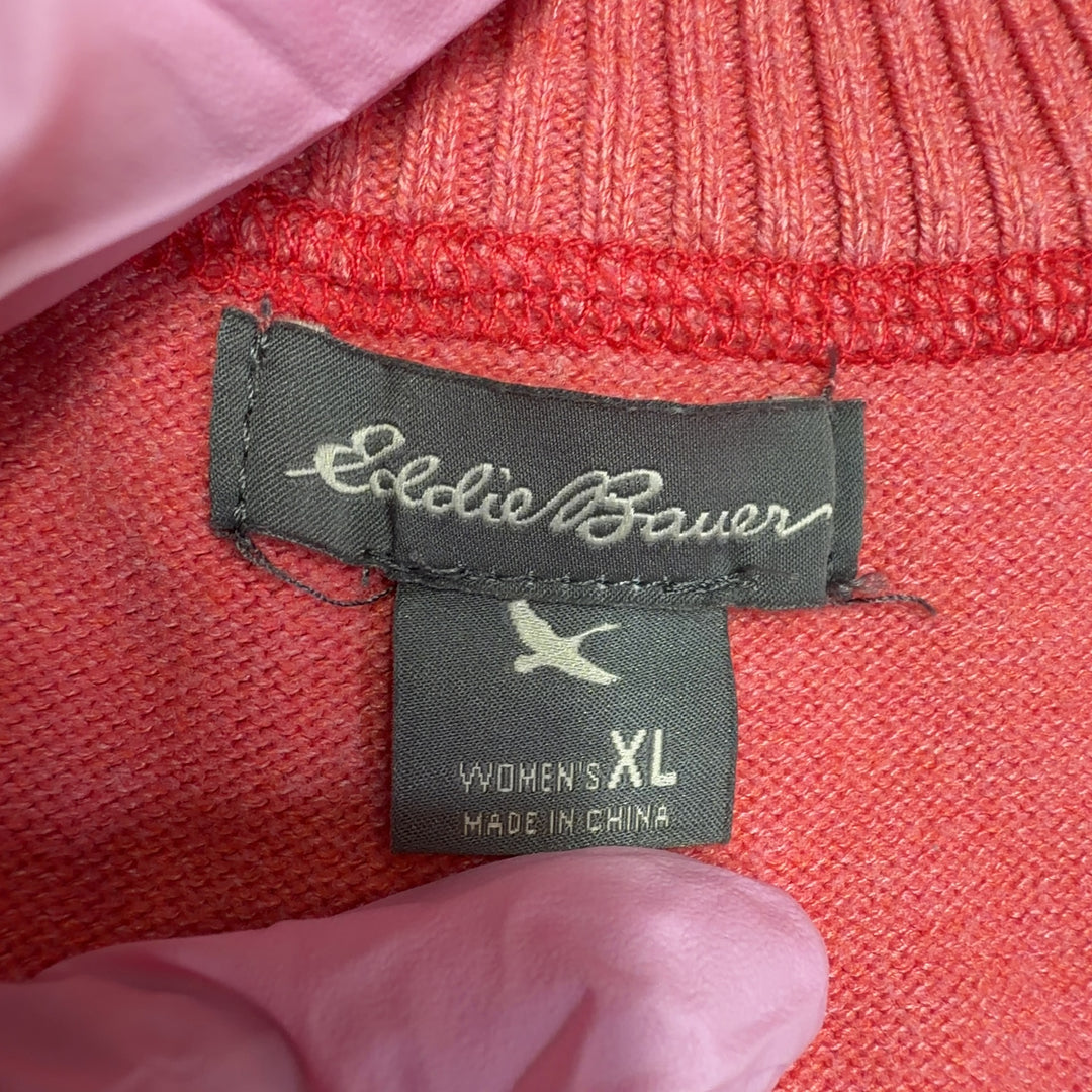 Tag view of coral Eddie Bauer knit hoodie showing relaxed fit and side seam details