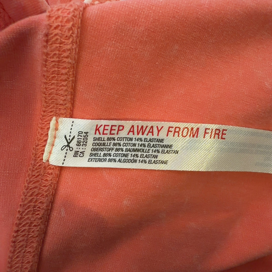 Coral henley tank top with white contrast trim, back view showing fitted silhouette