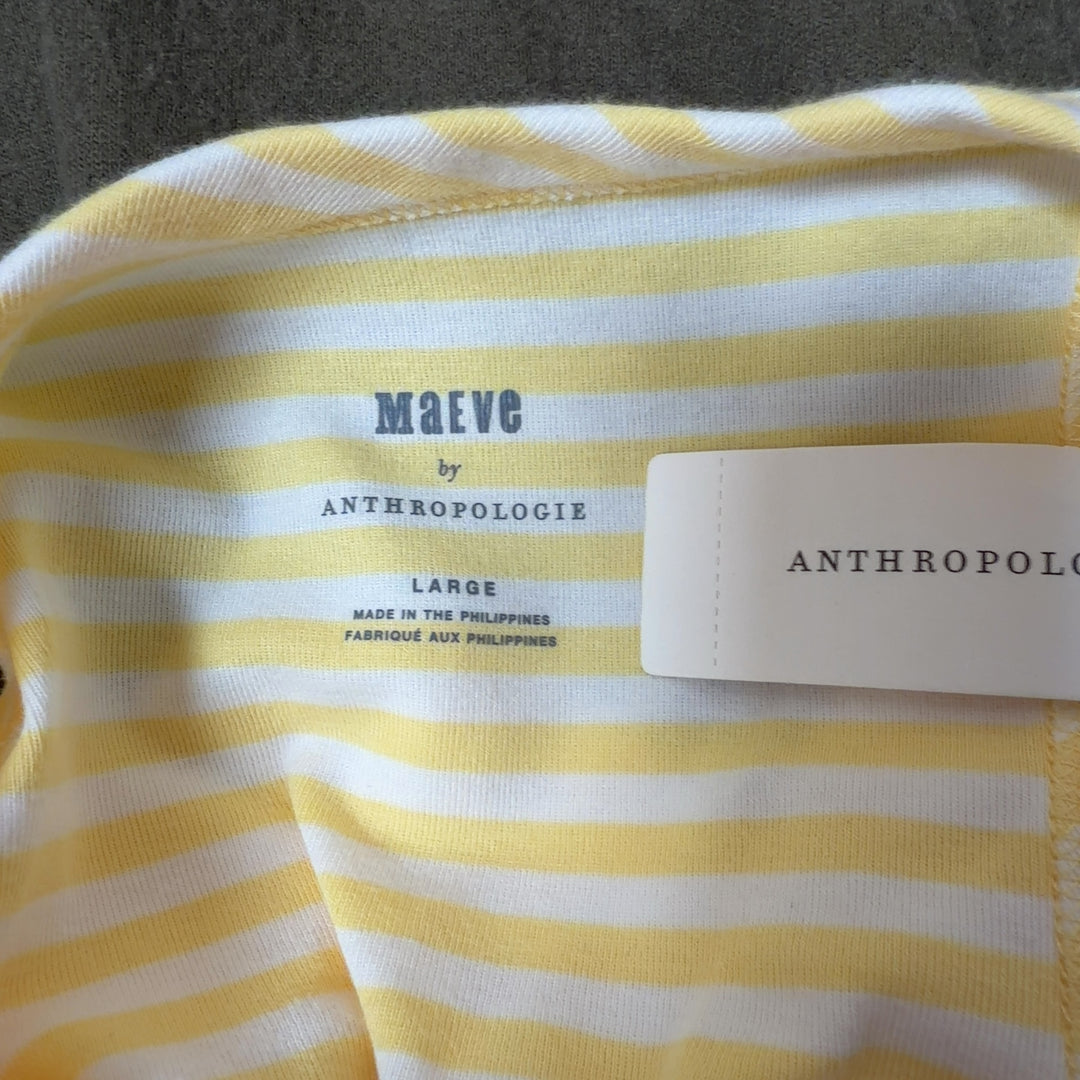 Yellow and white striped cotton tank top, back view showing relaxed fit