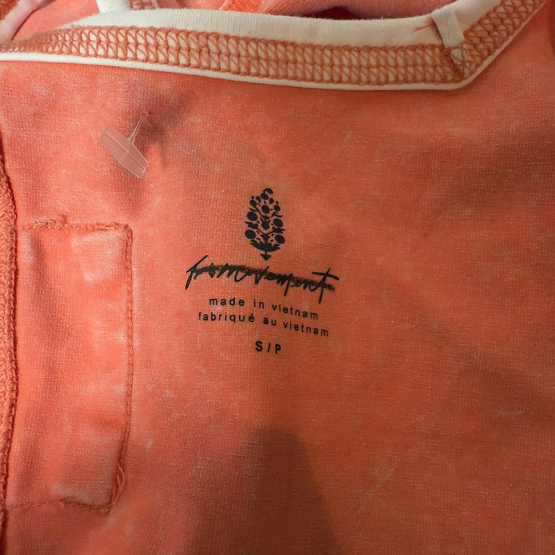 Coral henley tank top with white contrast trim, back view showing fitted silhouette