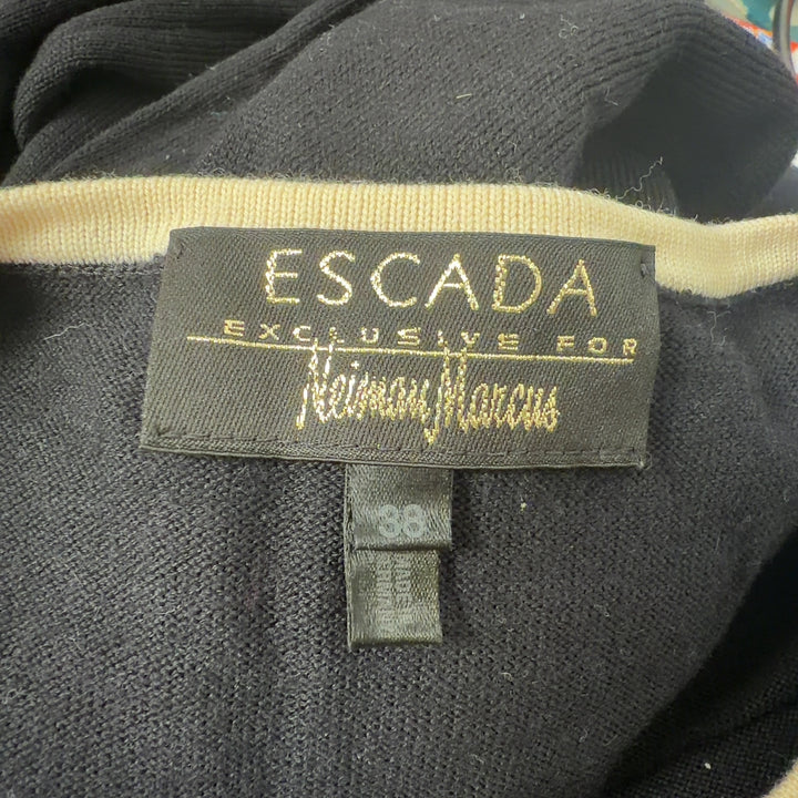 ESCADA black wool sleeveless tank top with cream trim, back view on model