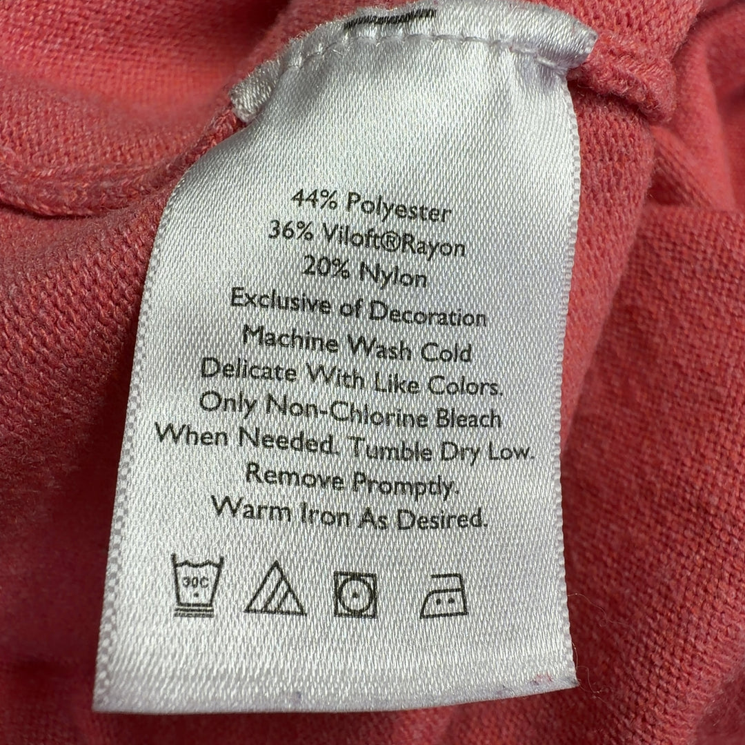 Tag view of coral Eddie Bauer knit hoodie showing relaxed fit and side seam details