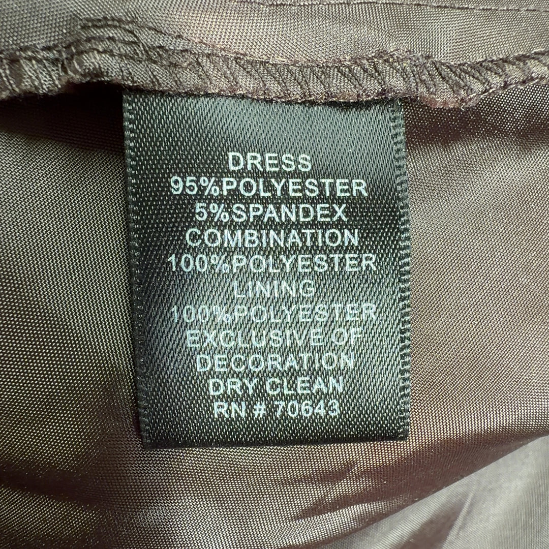 Tag view of brown wrap midi dress showing ruched waist detail and flowing A-line skirt