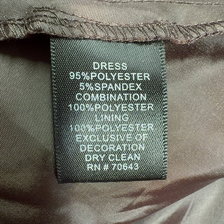Tag view of brown wrap midi dress showing ruched waist detail and flowing A-line skirt