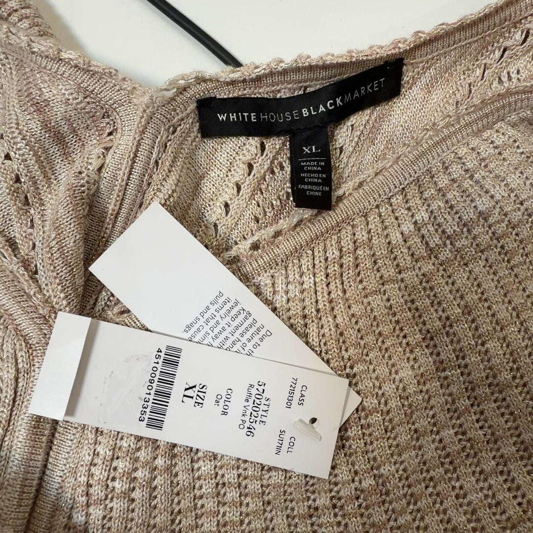 Cream ruffled v-neck knit top with eyelet detailing and flutter sleeves, back view