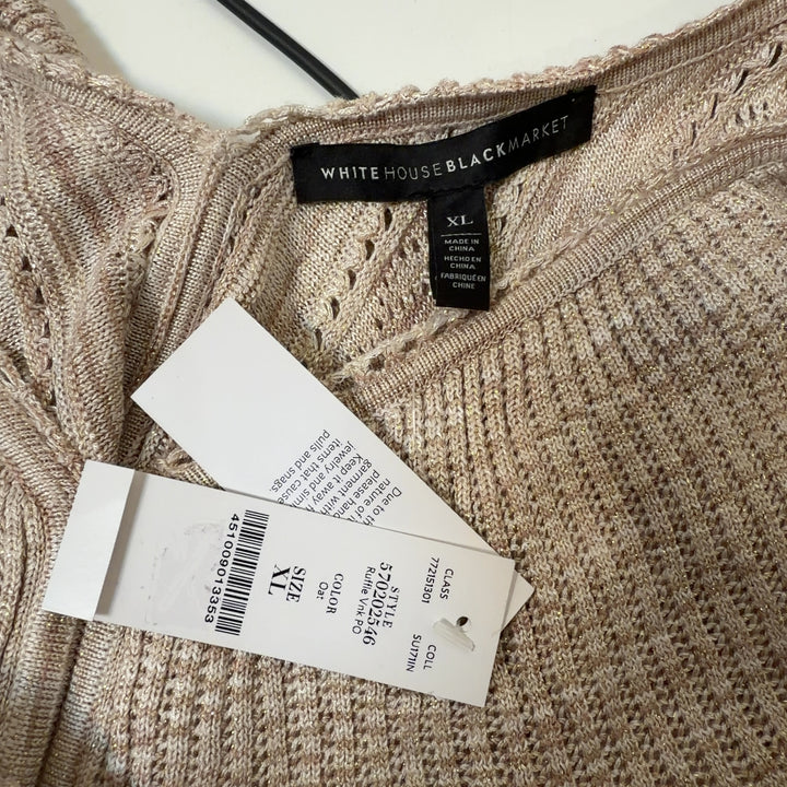 Cream ruffled v-neck knit top with eyelet detailing and flutter sleeves, back view