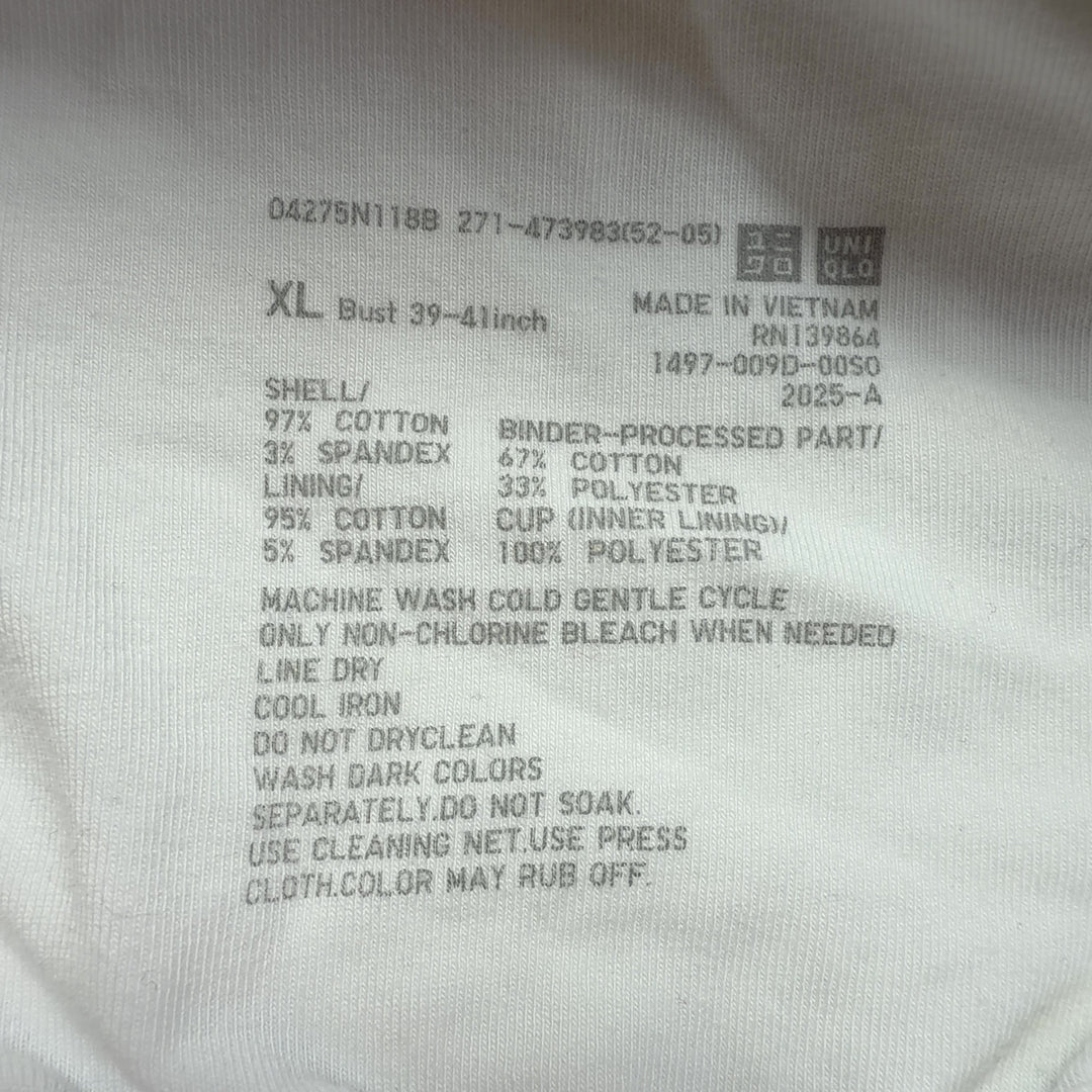 Cream ribbed sleeveless tank top back view, showing fitted silhouette
