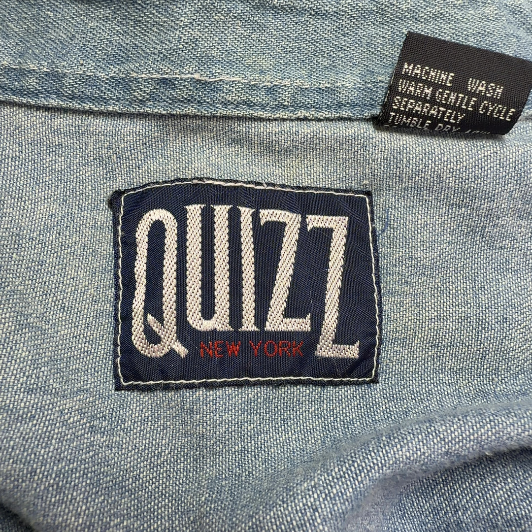 Light blue denim button-up shirt with teddy bear embroidery, back view