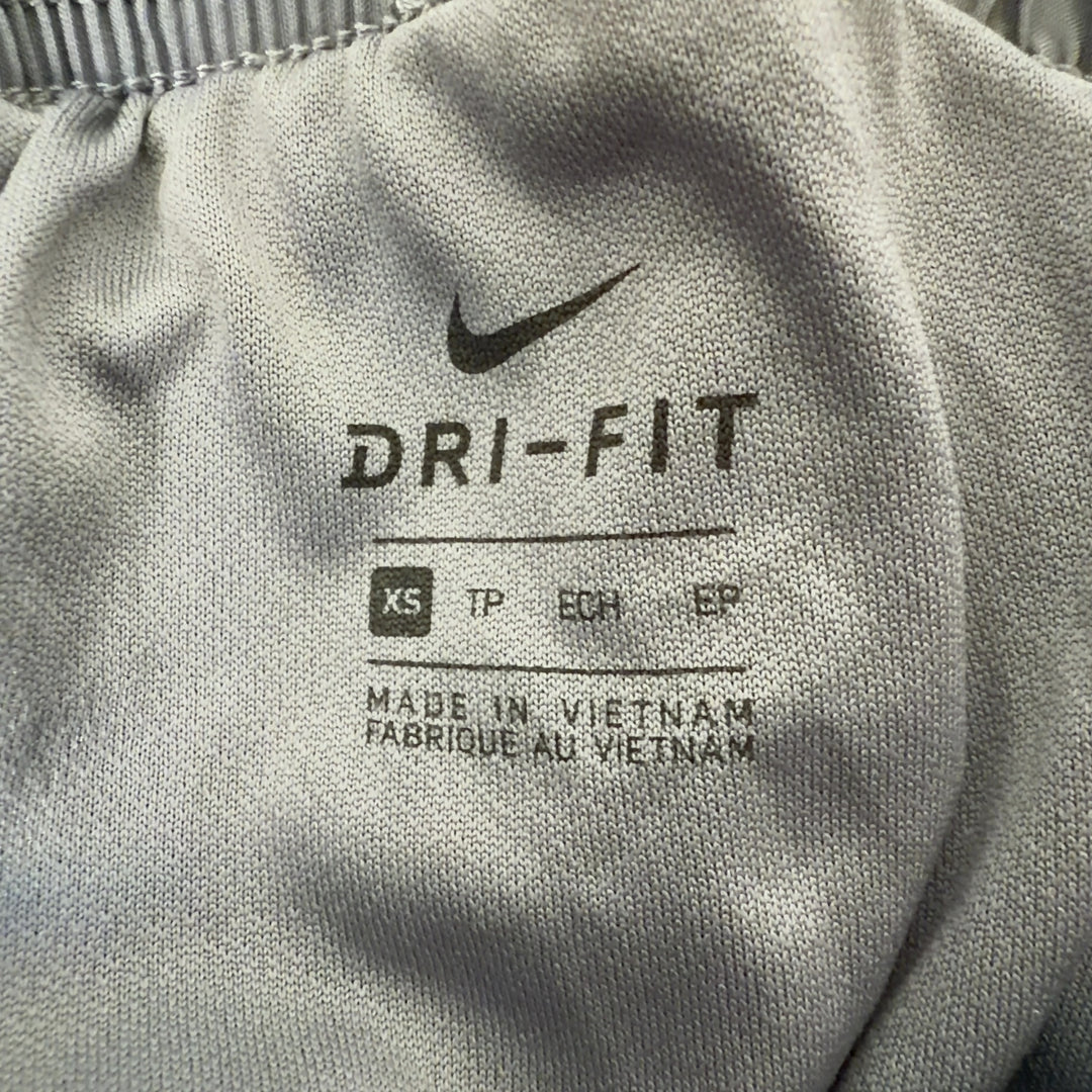 Gray Nike Dri-FIT Athletic Shorts back view showing elastic waistband and fit