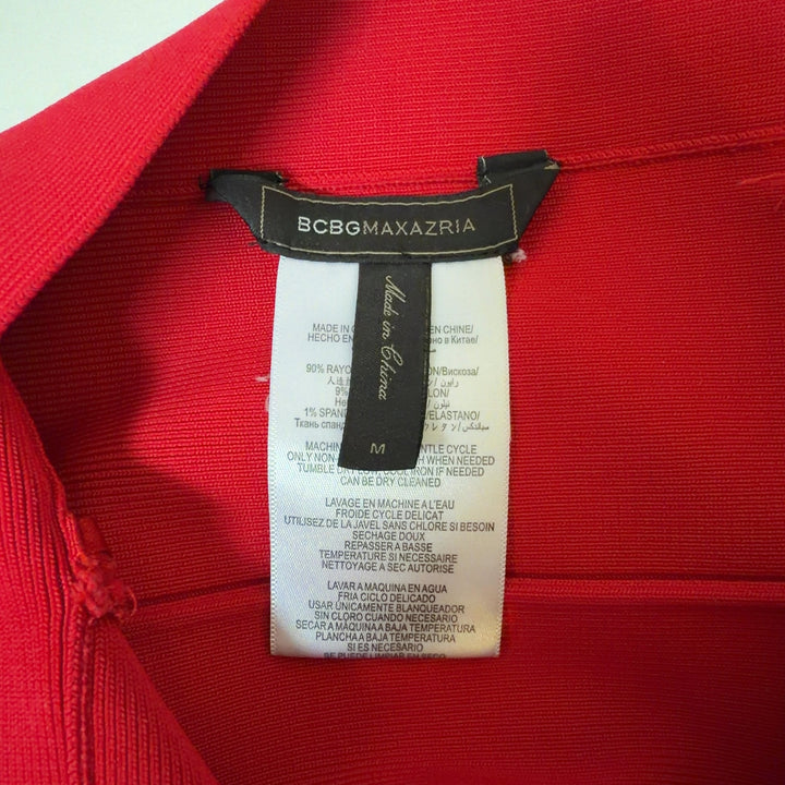 Red bandage mini skirt back view showing sleek silhouette and flattering cut