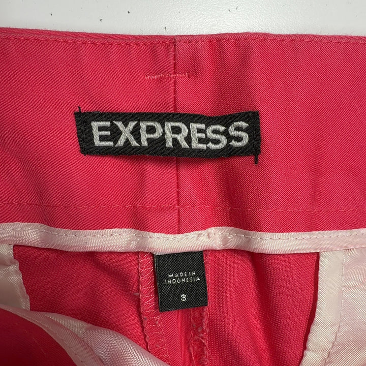 Tag view of red cotton-spandex tailored shorts from Express, showing clean lines and flattering fit