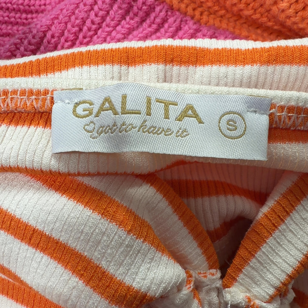 Orange and white striped strapless crop top with sweetheart neckline, back view