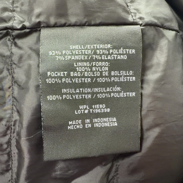 Black hooded puffer jacket back view showing structured quilted pattern and hood detail