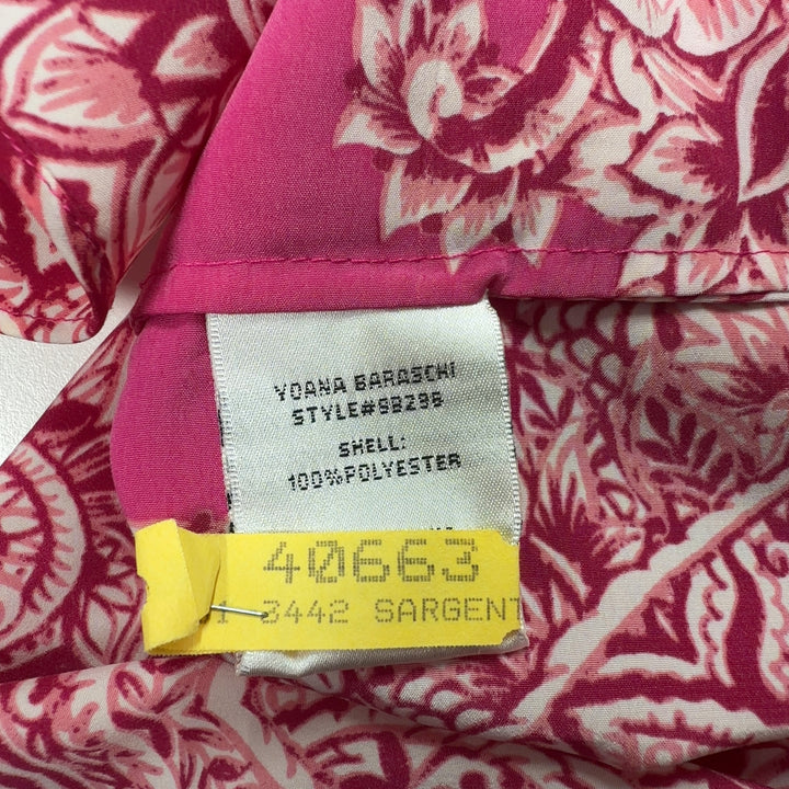 Tag view of pink ornate paisley tunic top by Yoana Baraschi showing full length and magenta side panels with yellow trim