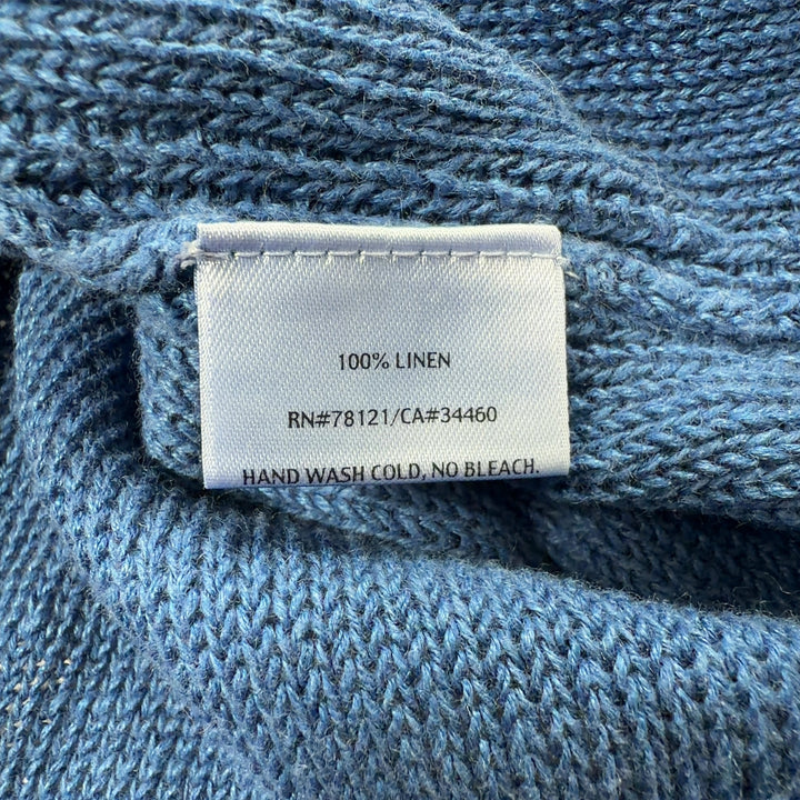 Blue linen knit sweater back view showing relaxed fit and ribbed hem detail