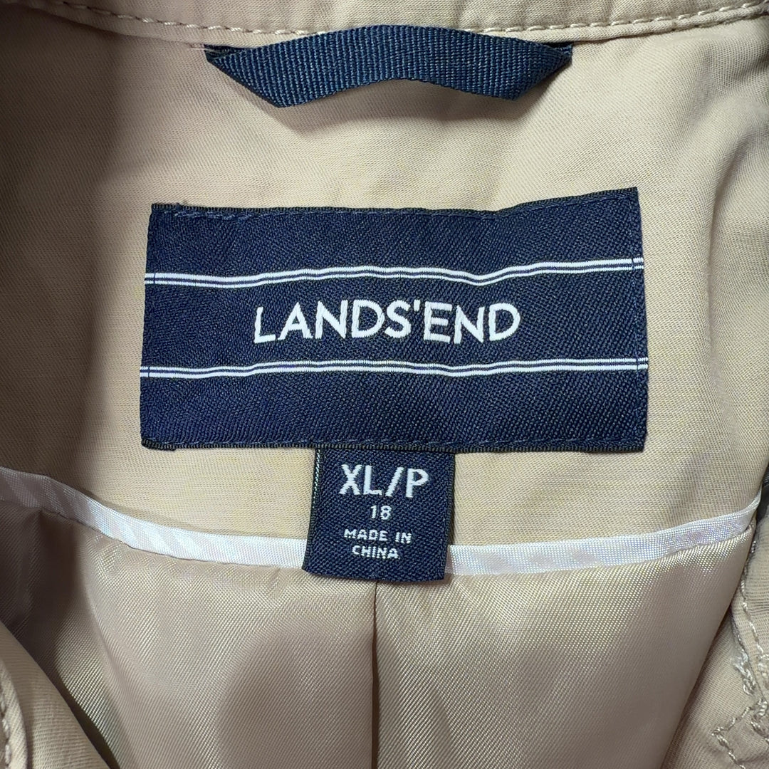 Beige trench coat with tied belt detail, back view showing knee-length cut