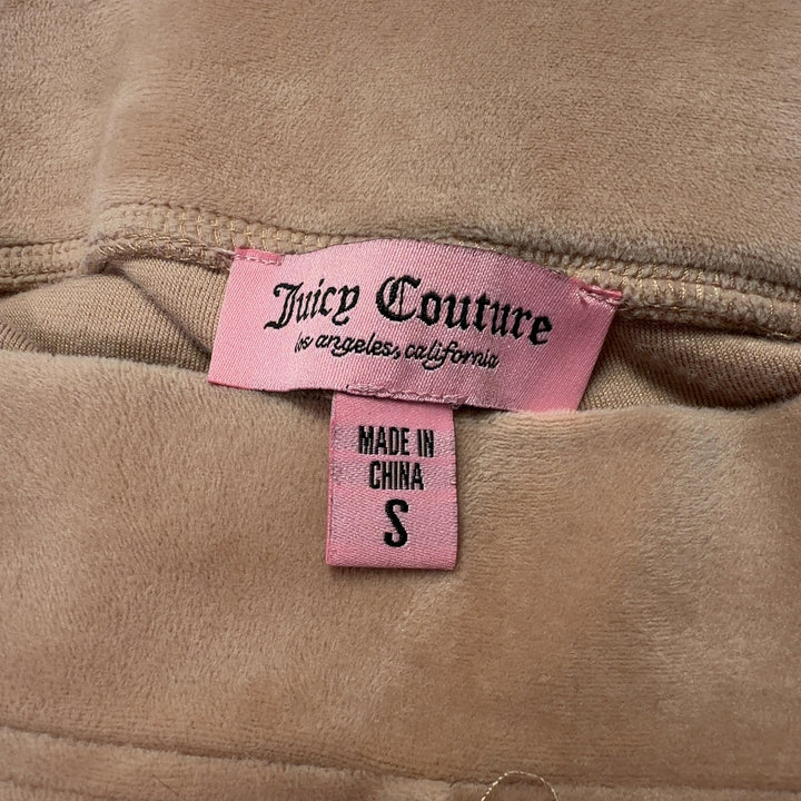 Beige velour activewear pants back view, showing straight-leg silhouette and fit