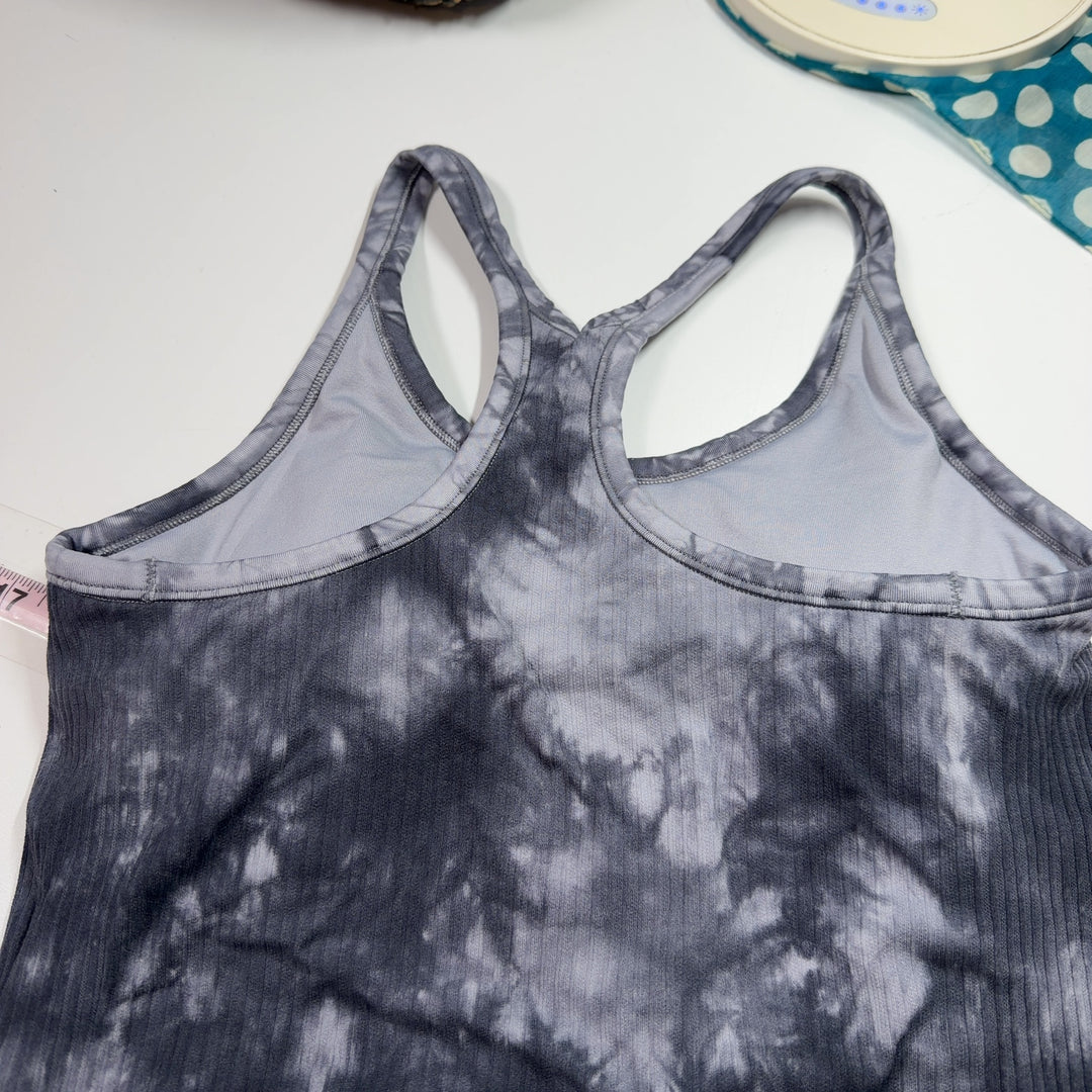 Gray tie-dye ribbed tank top back view on model, showing form-fitting design