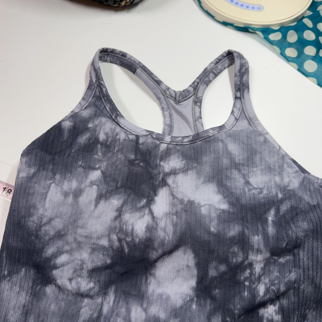 Gray tie-dye ribbed tank top back view on model, showing form-fitting design
