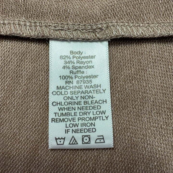 Beige open-front cardigan with pleated cream hem detail, back view