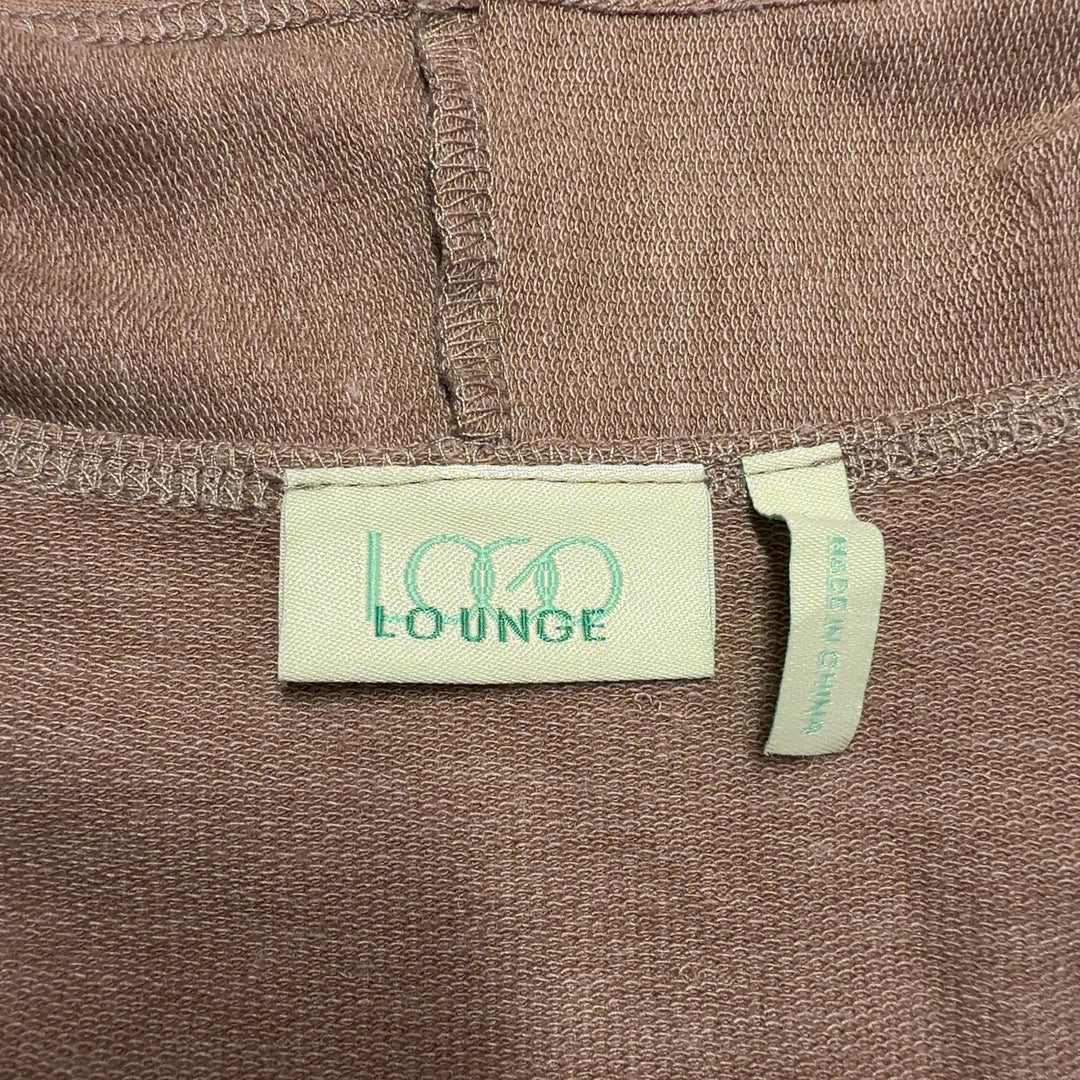 Beige open-front cardigan with pleated cream hem detail, back view
