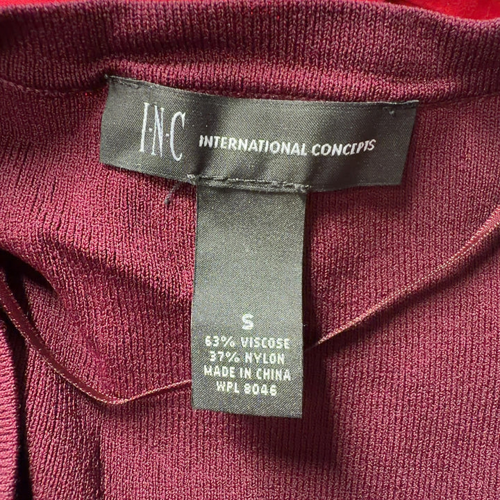 Burgundy open front cardigan with tie-detail cuffs, back view showing relaxed fit and drape