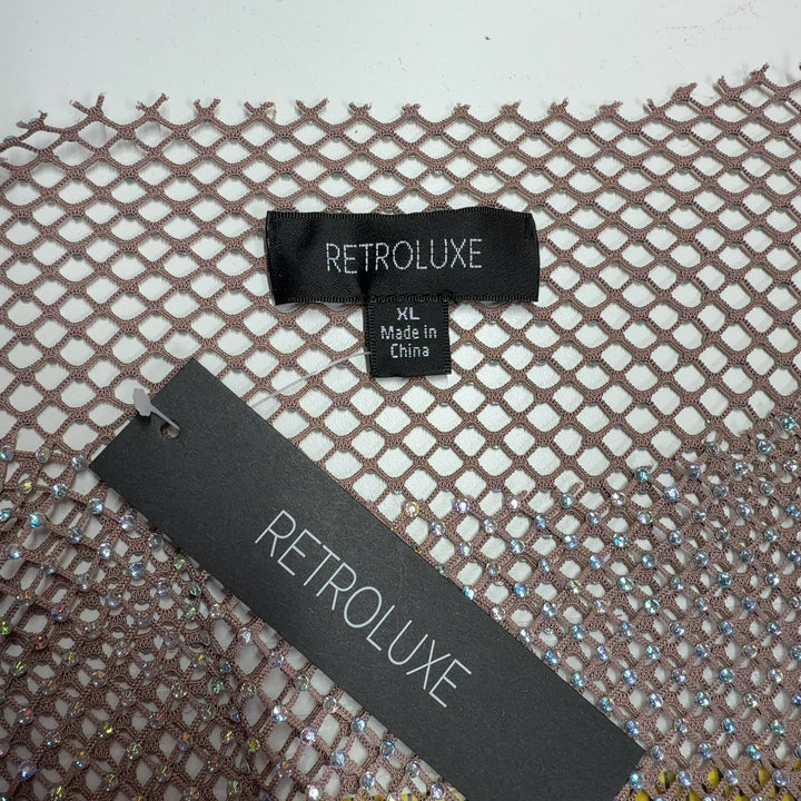 Silver sequin mesh long sleeve knit top with gradient design, back view on model