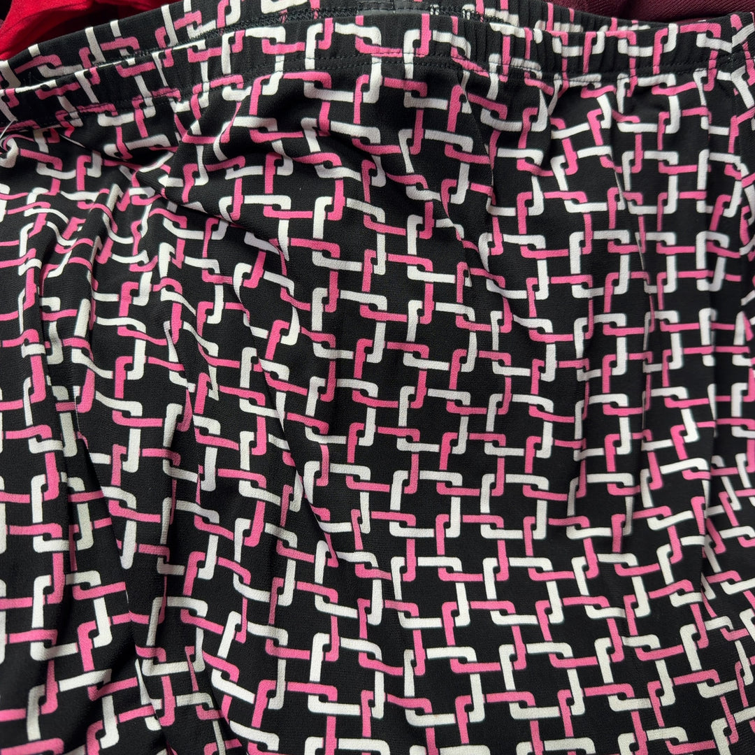 Burgundy geometric lattice print maxi skirt back view, showing elegant drape and length
