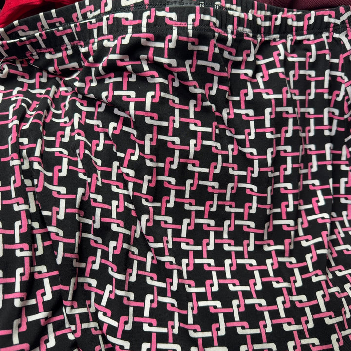 Burgundy geometric lattice print maxi skirt back view, showing elegant drape and length