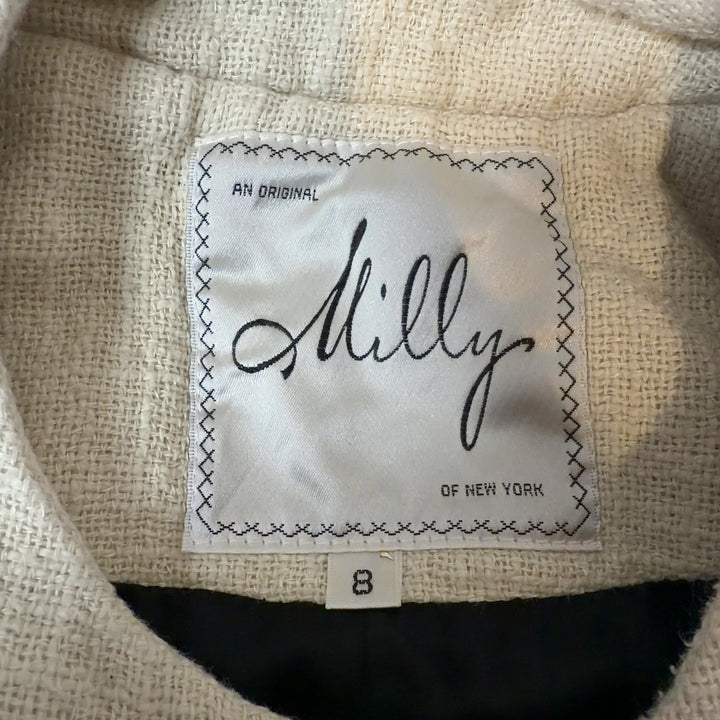 Black and cream plaid Milly jacket back view showing geometric pattern and cropped silhouette