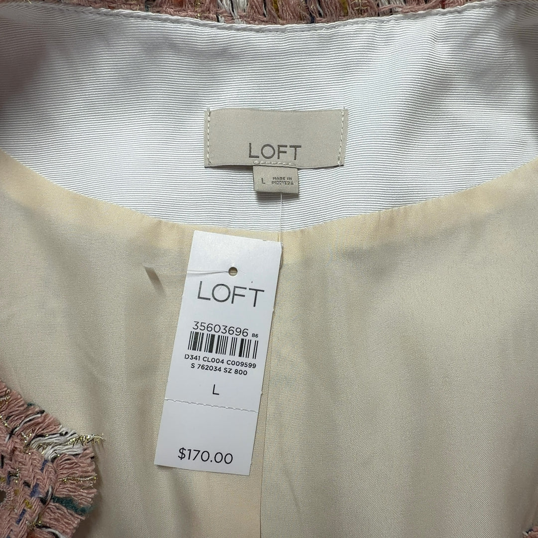 Tag view of LOFT beige tweed blazer jacket showing structured silhouette and button details