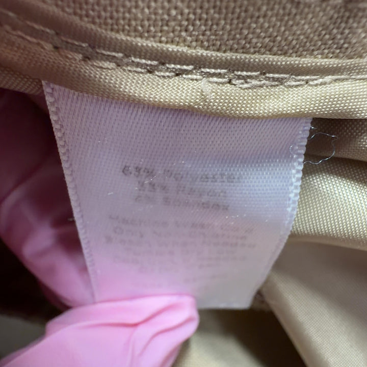 Beige wide-leg pants back view, displaying elegant drape and comfortable silhouette