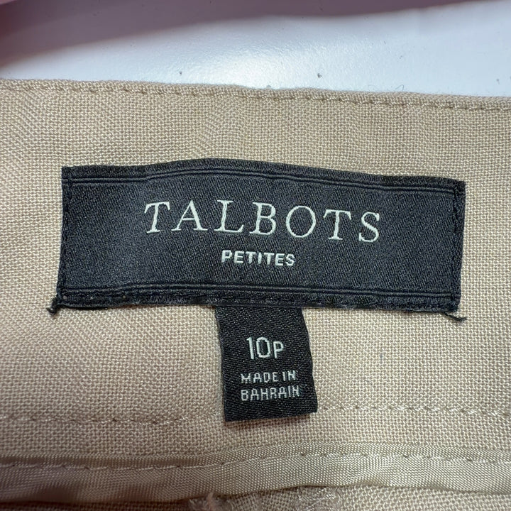 Beige wide-leg pants back view, displaying elegant drape and comfortable silhouette